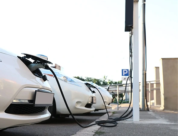 EV charging points powering multiple electric vehicles at a modern EV charging station for fast, efficient charging.