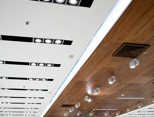 Commercial building roof lighting installation showcasing expert commercial electrical service for enhanced safety and visibility.