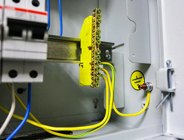 Circuit board with breaker and wiring showcasing professional electrical installation and repair services.