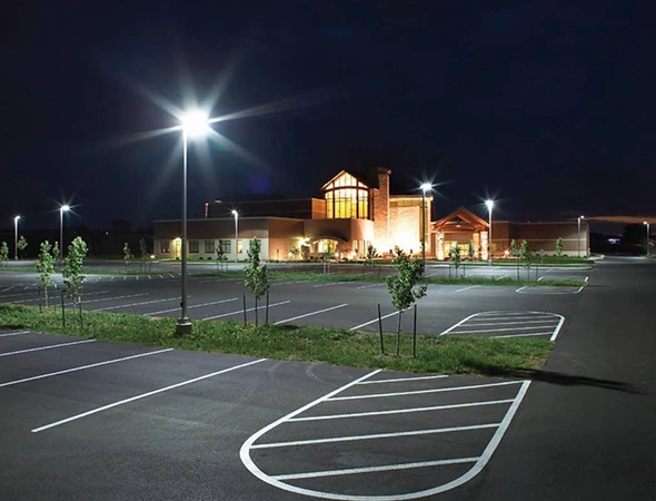 Solar-powered parking light installed, illuminating the parking area with eco-friendly, energy-efficient lighting.